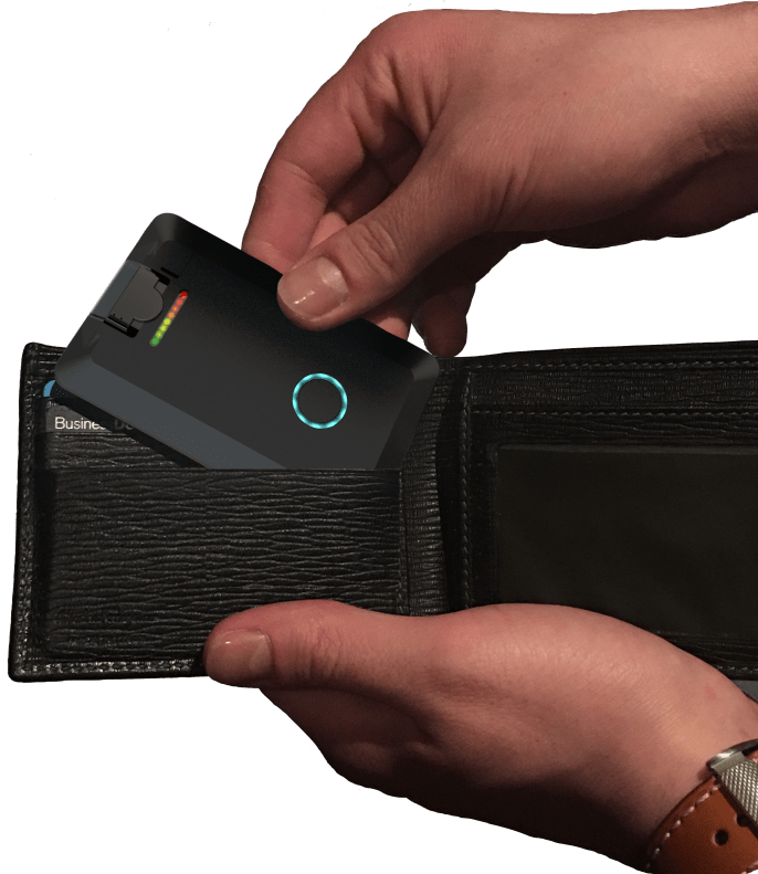 Zepto vaporizer tucked into a wallet beside a phone